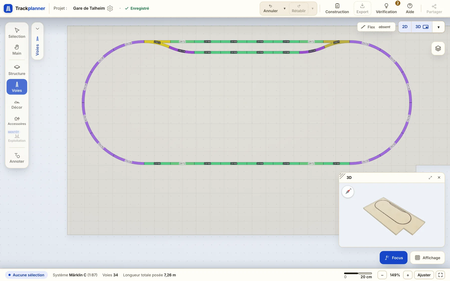 L’éditeur de Trackplanner avec une gare à double voie en voie C de Märklin : barre d’outils à gauche, plan avec les références, vue 3D en bas à droite.